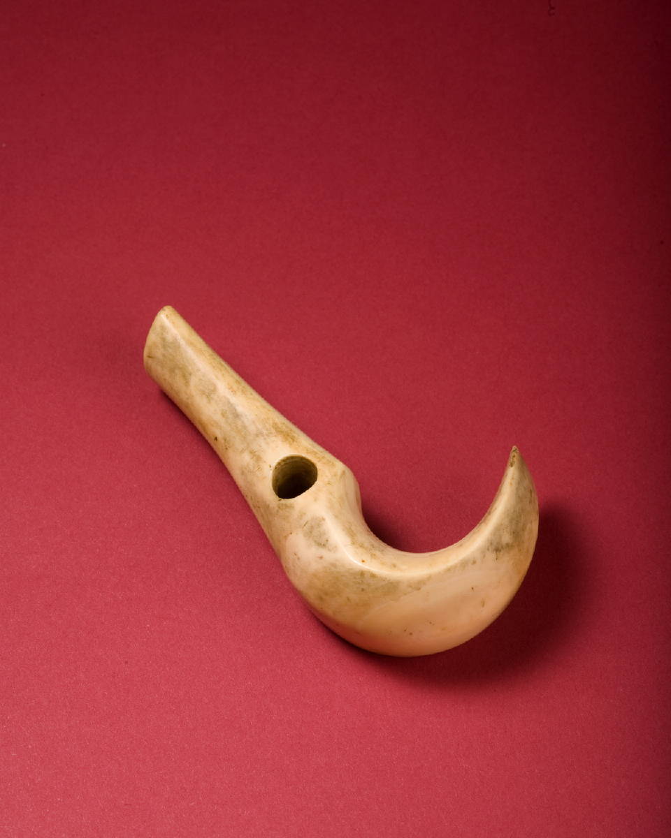 Appraisal: HAWAIIAN 'LEI NIHO PALAOA' WHALE IVORY PENDANT IN OLD PATINA