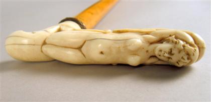 Appraisal: Continental carved ivory and malacca cane late th century The