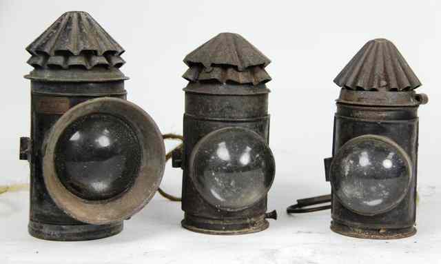 Appraisal: Three ebonised lamps