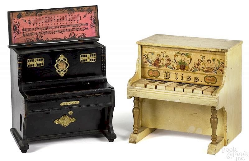 Appraisal: Two children's toy pianos Two children's toy pianos each with