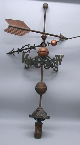 Appraisal: Ball finial cast iron arrow with C-scrolls and small copper