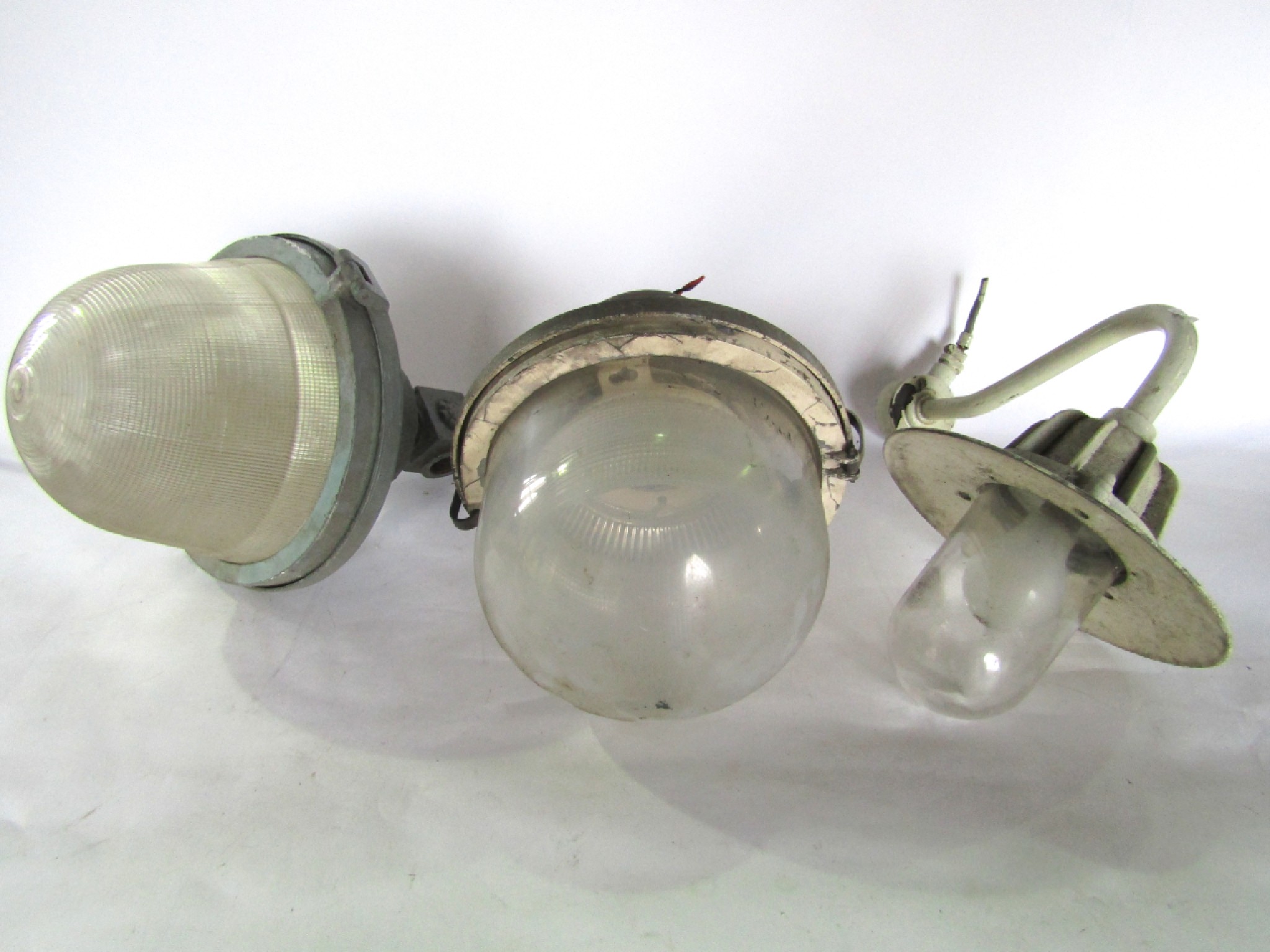 Appraisal: A trio of various th century industrial street lamp heads