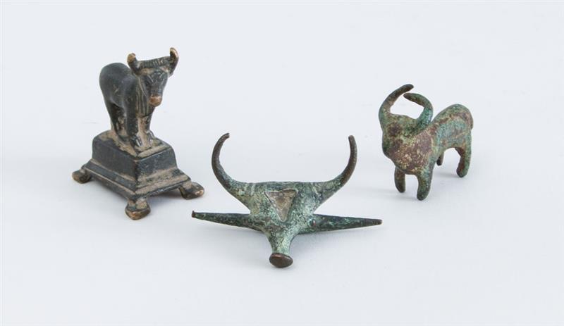 Appraisal: THREE ANCIENT BRONZES IN THE FORM OF BULLS x x