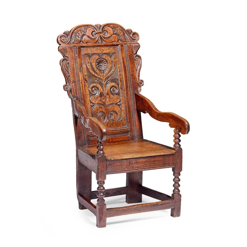 Appraisal: OAK WAINSCOT ARMCHAIR TH CENTURY the scroll and foliate carved