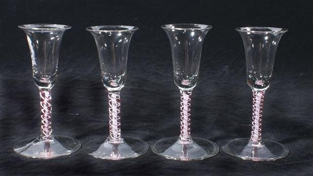 Appraisal: A SET OF FOUR DUTCH COLOURED TWIST WINE GLASSES