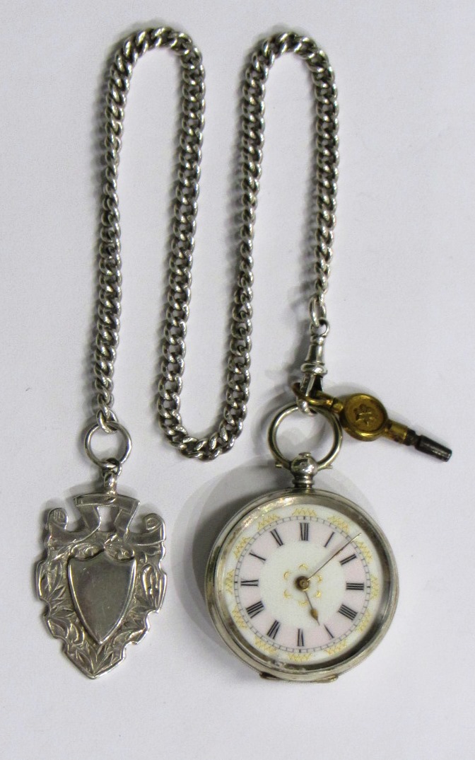 Appraisal: A ladies key wind openfaced fob watch with a cylinder