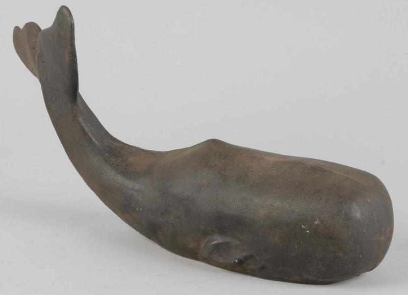 Appraisal: Cast Iron Whale Doorstop Description Made by Virginia MetalCrafters Condition