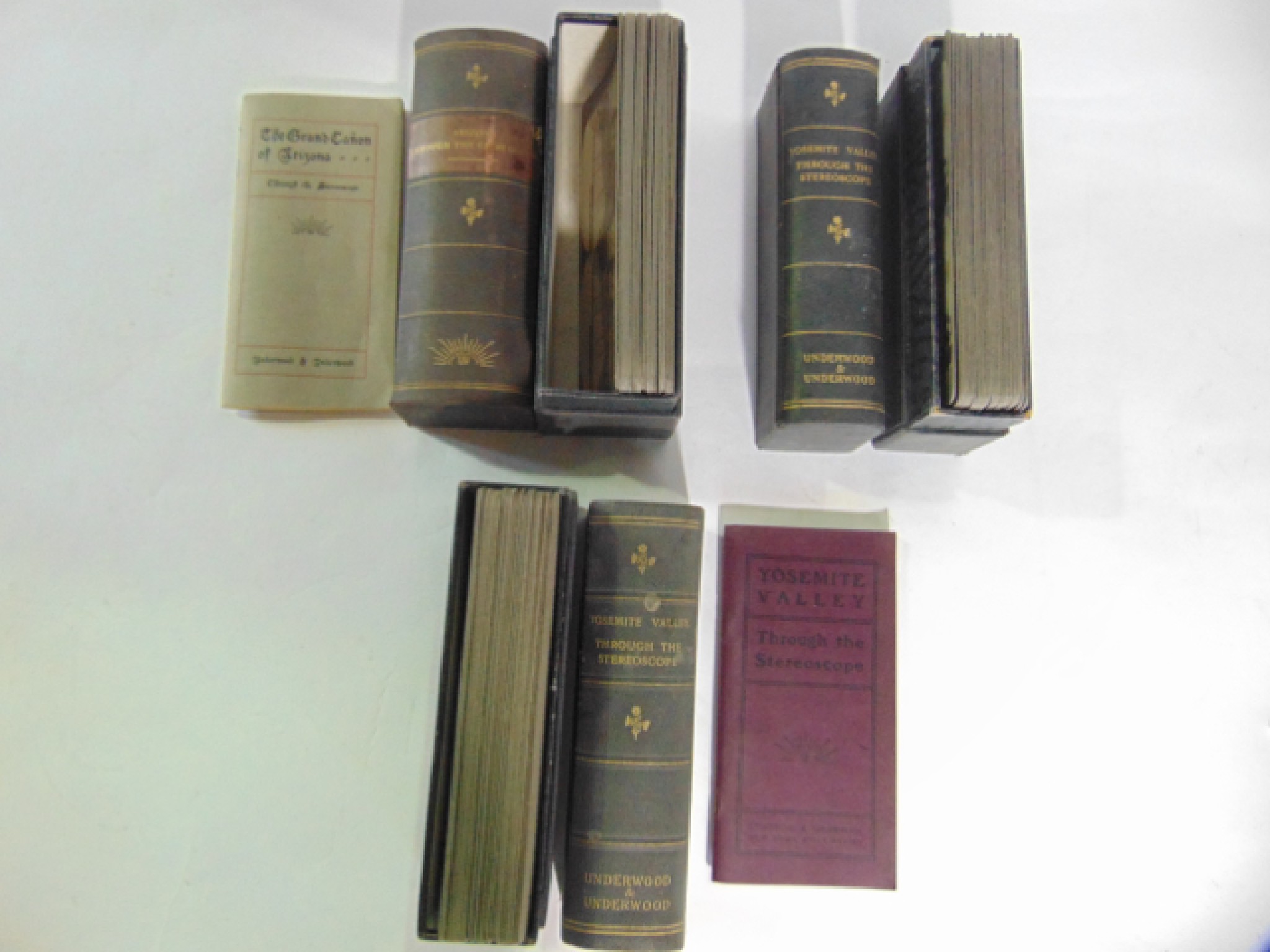 Appraisal: Two cased volumes of early photographic stereoscopic slides by Underwood