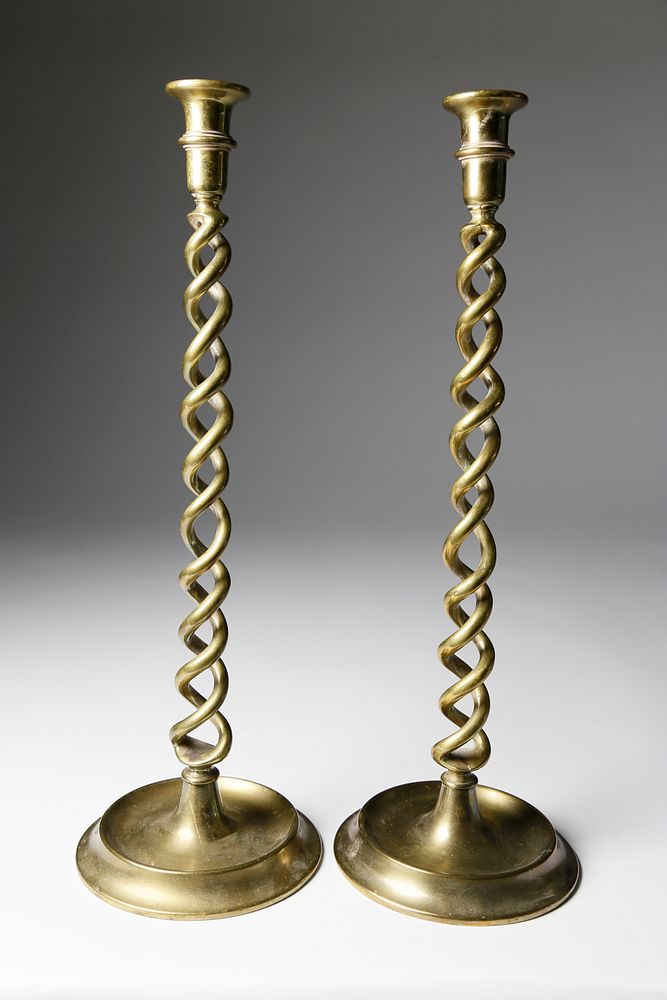 Appraisal: Pair of Brass Open Twist Tall Candlesticks Pair of Brass