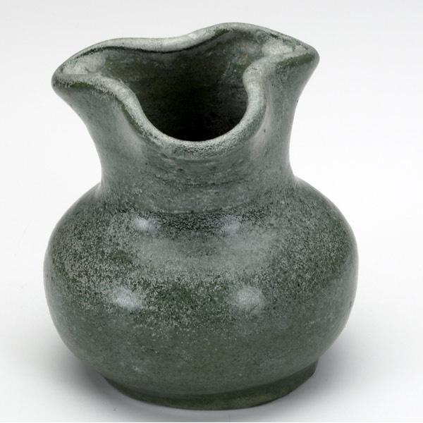 Appraisal: MERRIMAC Small vase with lobed opening covered in matte green