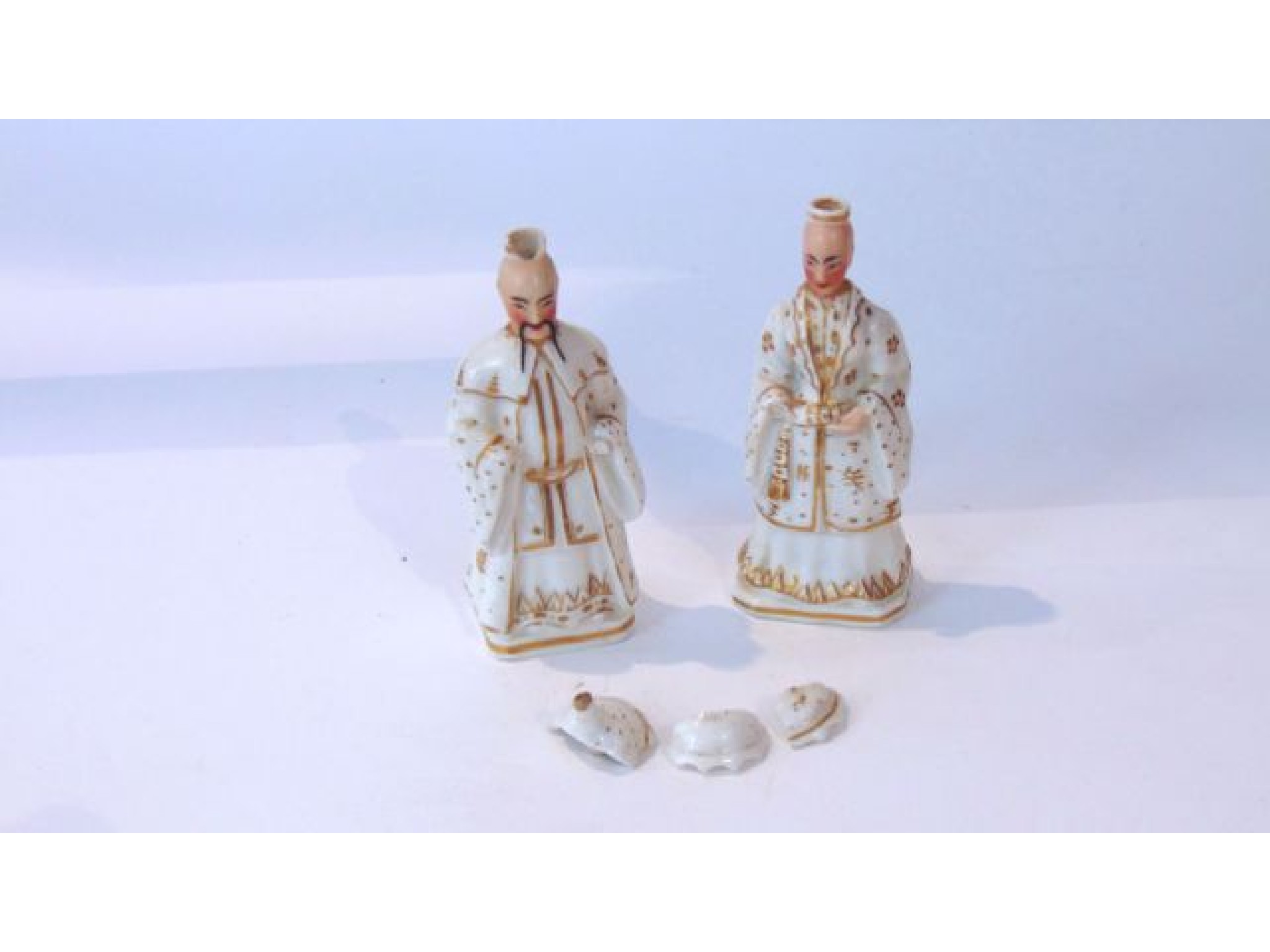 Appraisal: A pair of th century white glazed ceramic flasks in