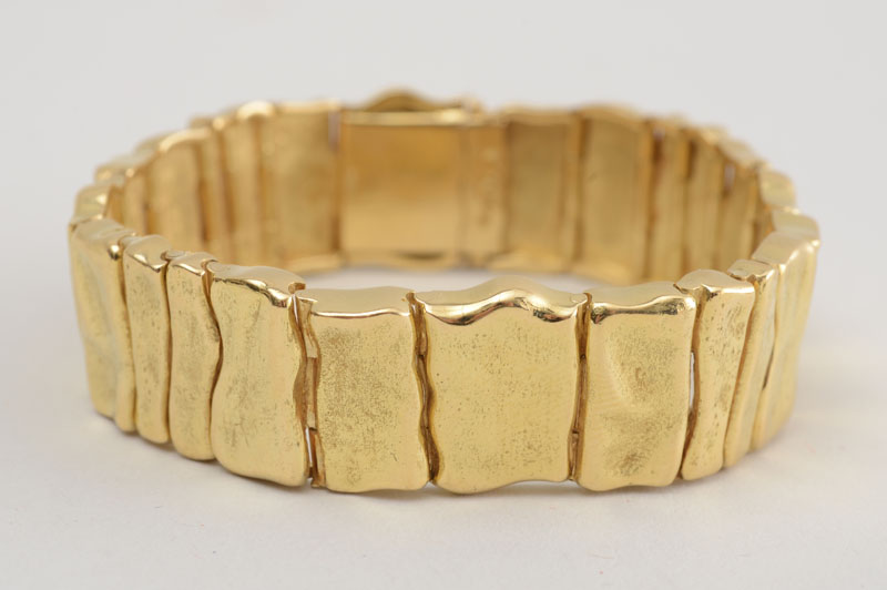 Appraisal: ELIZABETH GAGE K YELLOW GOLD FLEXIBLE BRACELET Signed 'Gage' stamped