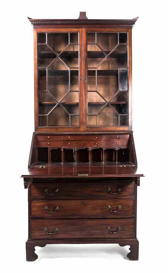 Appraisal: A George III Mahogany Secretaire having a molded and dentiled