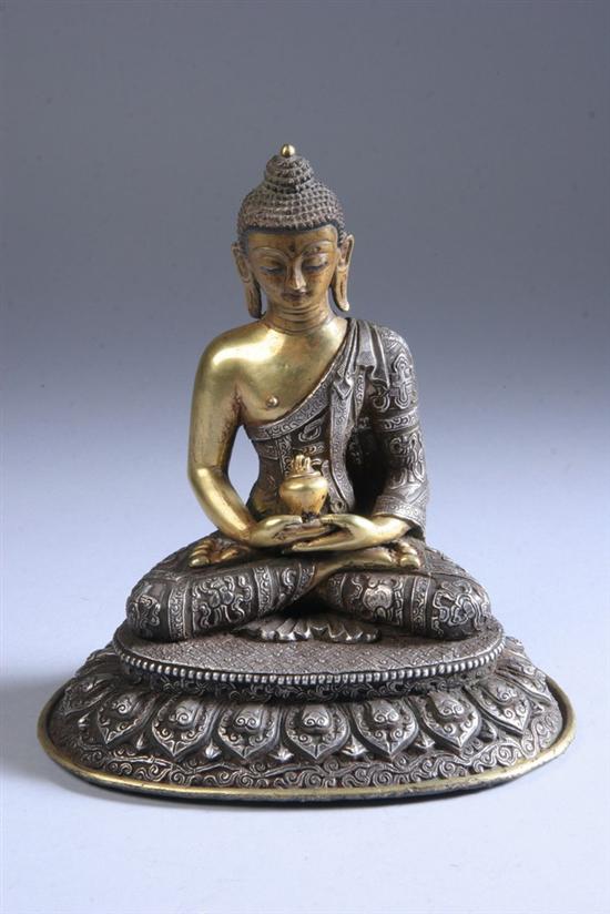 Appraisal: CHINESE SILVER AND BRONZE FIGURE OF AMITABHA BUDDHA Seated in