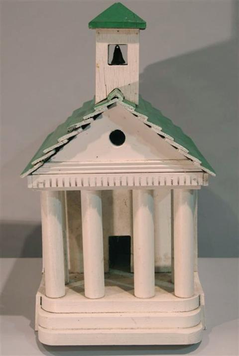 Appraisal: AMERICAN GREEN AND WHITE PAINTED BIRD HOUSE th century modeled