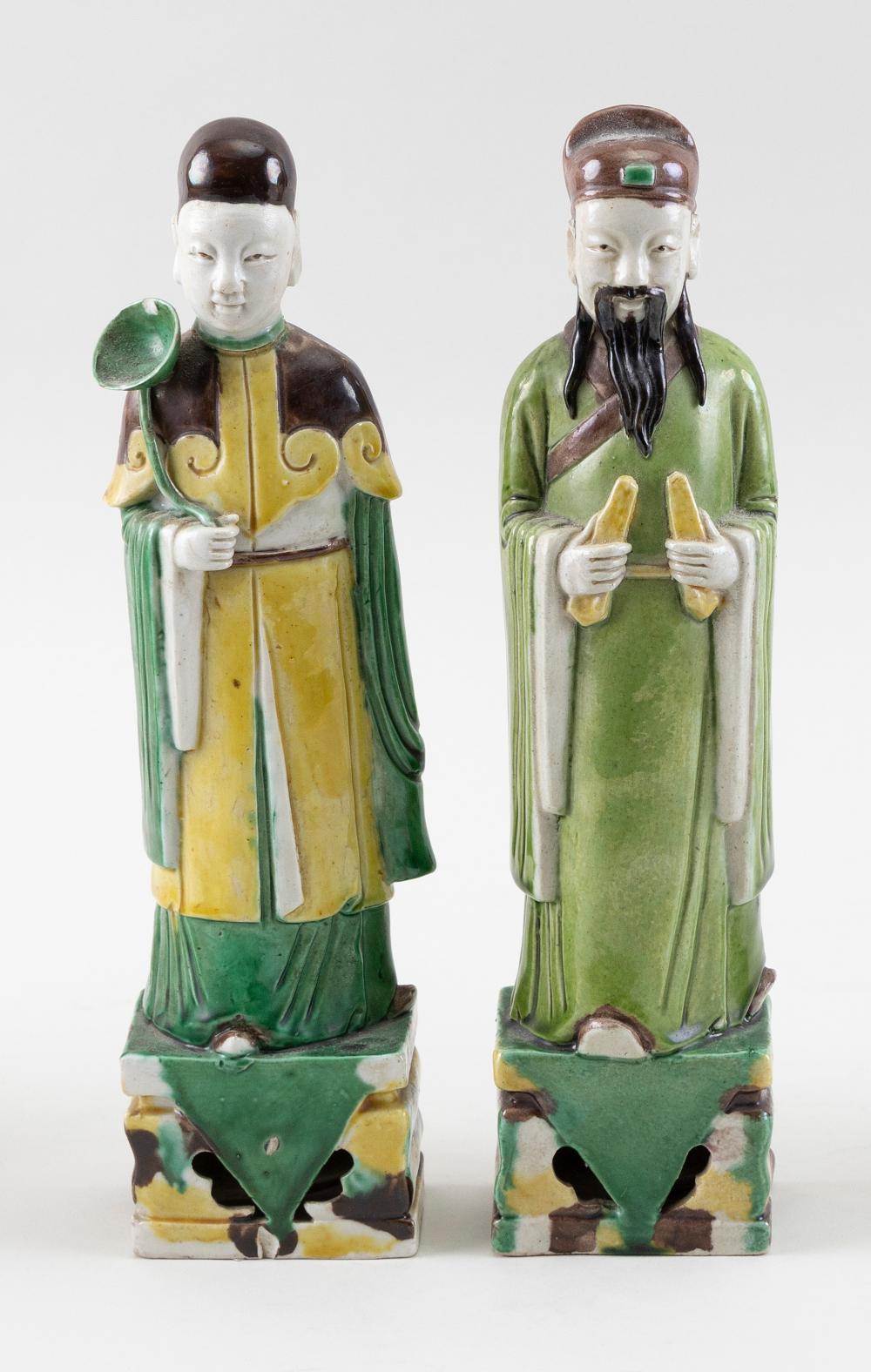 Appraisal: TWO CHINESE SANCAI GLAZE PORCELAIN ATTENDANT FIGURES TH CENTURY HEIGHTS