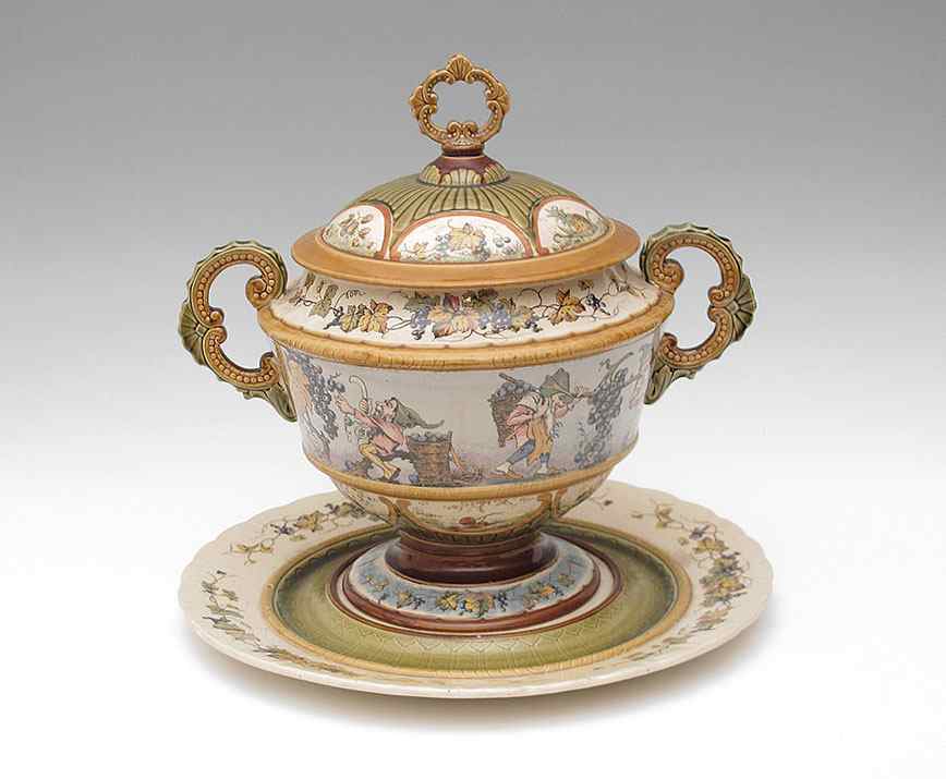 Appraisal: METTLACH PUG PUNCH BOWL AND UNDER PLATE Punch bowl with