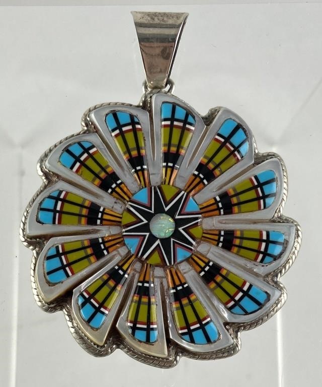 Appraisal: Sterling silver pinwheel pendant with micro inlaid turquoise multi-colored coral