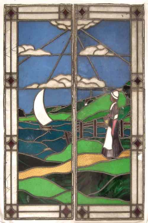 Appraisal: An early th Century coloured and leaded glass diptych -