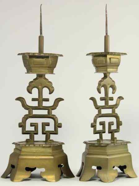 Appraisal: Pair of Chinese Bronze Candlesticks th century pierced pagoda panel