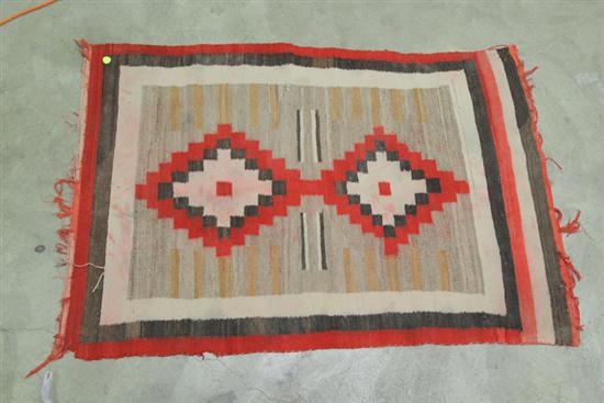 Appraisal: NAVAJO RUG Red brown and natural with stepped diamond medallions