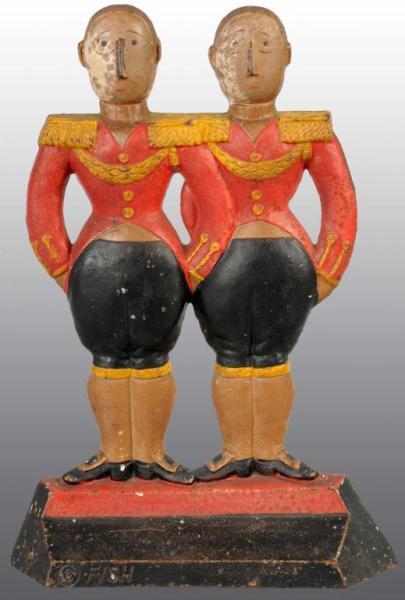 Appraisal: Small Cast Iron Footmen Doorstop Description Made by Hubley Signed