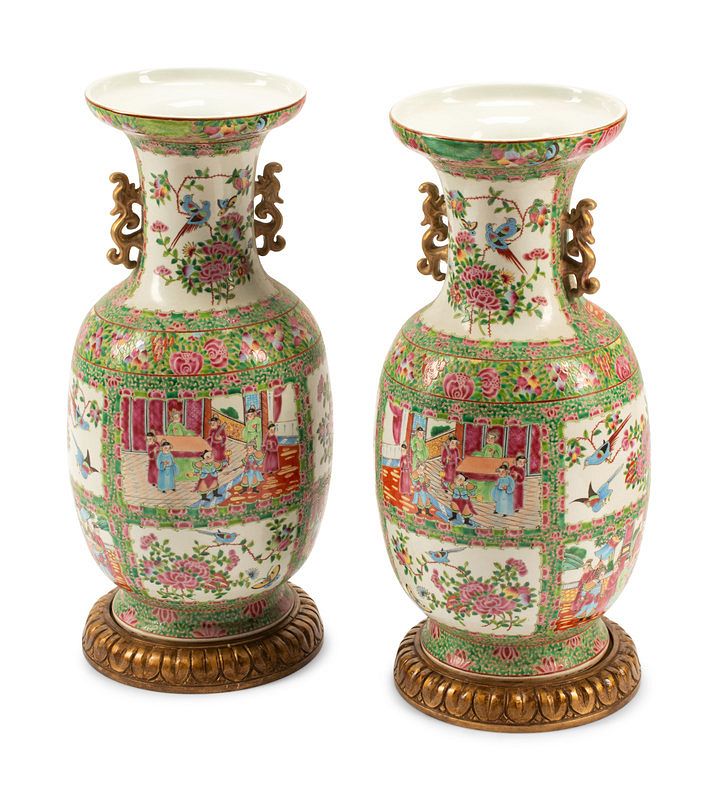 Appraisal: A Pair of Rose Medallion Porcelain Vases on Carved Giltwood