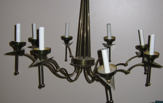 Appraisal: ITALIAN MODERNIST DESIGN BRASS CHANDELIER Eight arms emanating from a