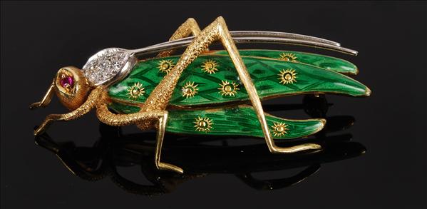 Appraisal: An enamel and diamond brooch designed as a grasshopper decorated