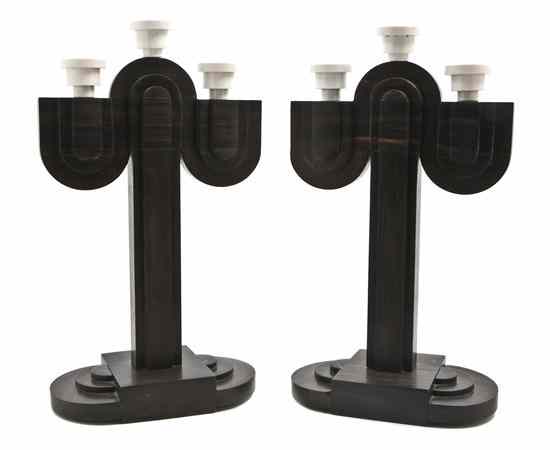 Appraisal: A Pair of Art Deco Ebony and Ivory Three-Light Candelabra