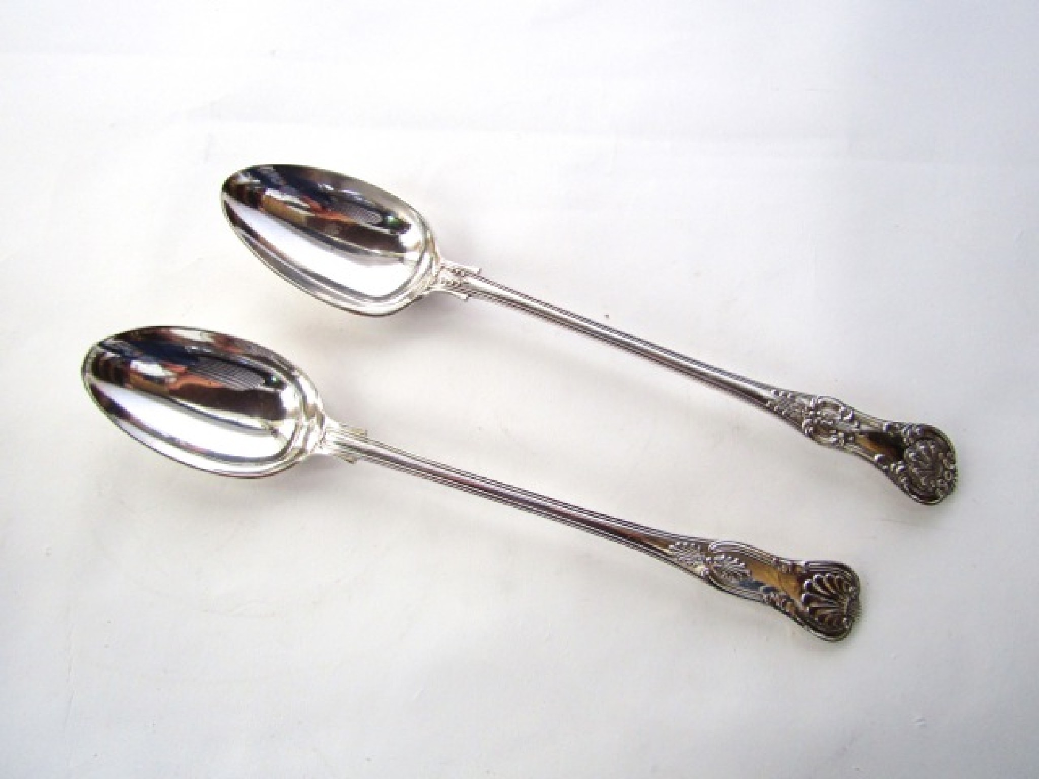 Appraisal: A near pair of good quality silver plated shell and