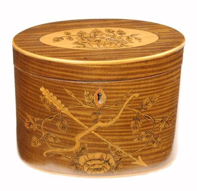 Appraisal: A George III harewood and marquetry oval tea caddy with