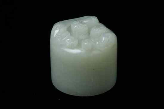 Appraisal: CHINESE CELADON JADE CYLINDRICAL DRAGON SEAL - in diam