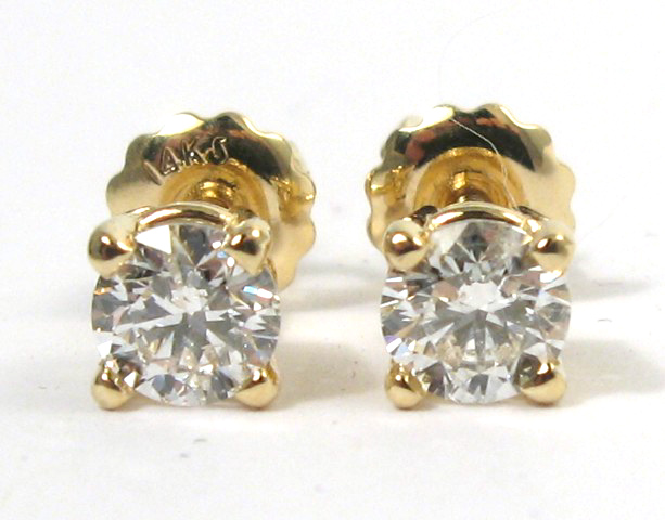 Appraisal: DIAMOND AND YELLOW GOLD EAR STUDS each k gold and