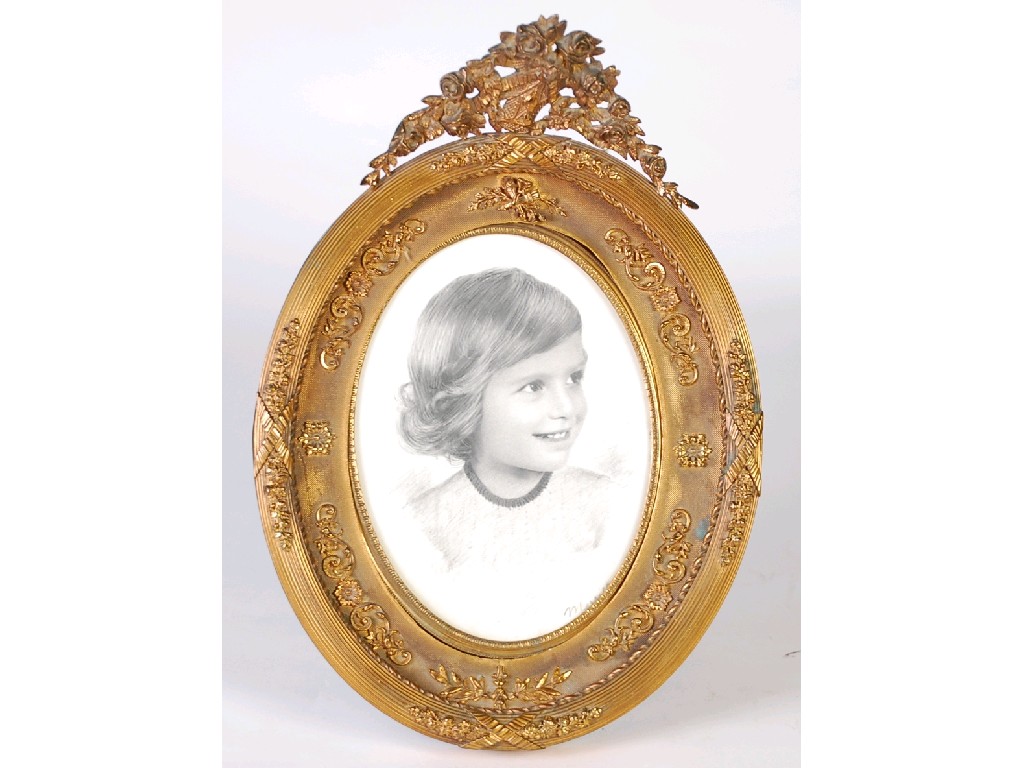 Appraisal: ORNATE GILT BRASS OVAL PICTURE FRAME WITH EASEL SUPPORT the