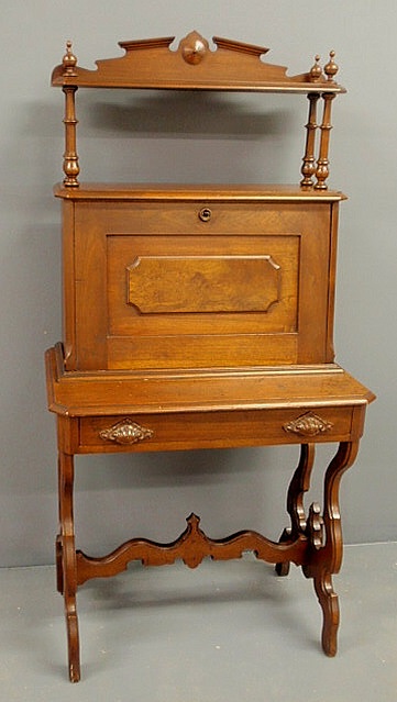 Appraisal: Victorian walnut secretaire abatant c with an upper shelf fall