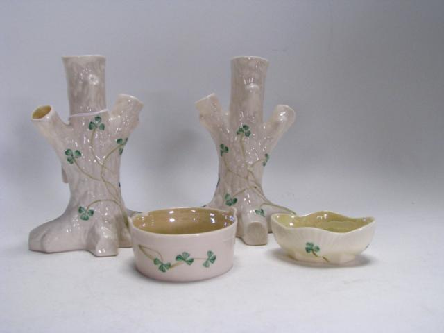 Appraisal: Four pieces Belleek Irish porcelain including two tree stump vases