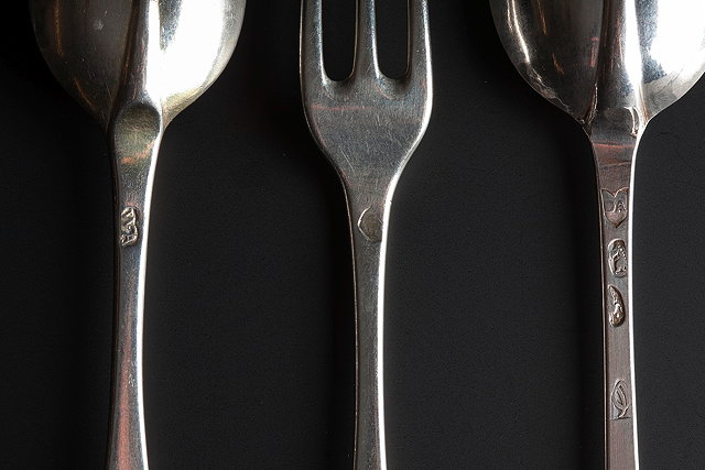 Appraisal: A PAIR OF QUEEN ANNE HANOVARIAN STYLE DESSERT SPOONS London