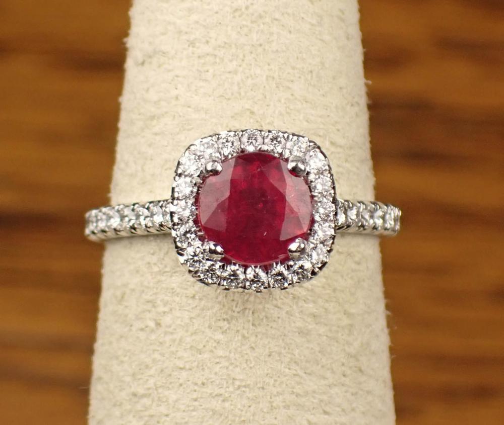 Appraisal: RUBY DIAMOND AND PLATINUM RING with forty round full-cut diamond