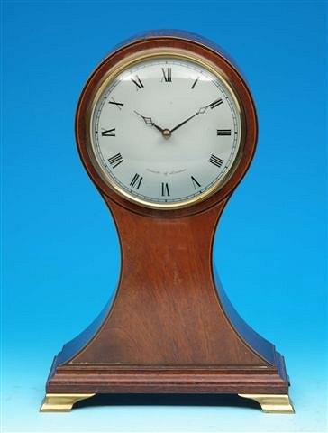 Appraisal: A mahogany cased mantel clock the dial with Roman numerals