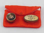 Appraisal: Erotica A satin purse containing two metal pill boxes one