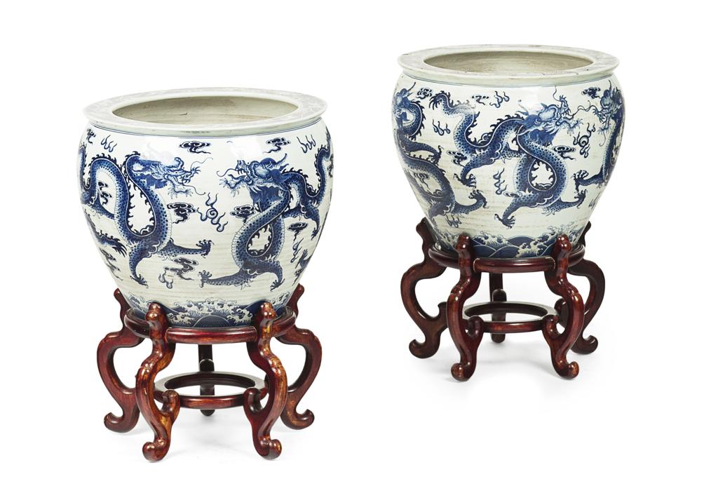 Appraisal: PAIR OF LARGE CHINESE BLUE AND WHITE JARDINIERES ON STAND