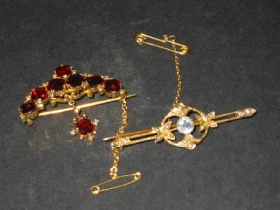 Appraisal: A VICTORIAN GARNET BROOCH comprising eight mix cut garnets set