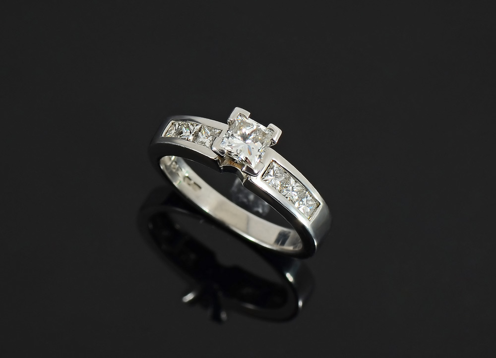 Appraisal: PLATINUM PRINCESS DIAMOND ENGAGEMENT RING Centering an approx Ct modified