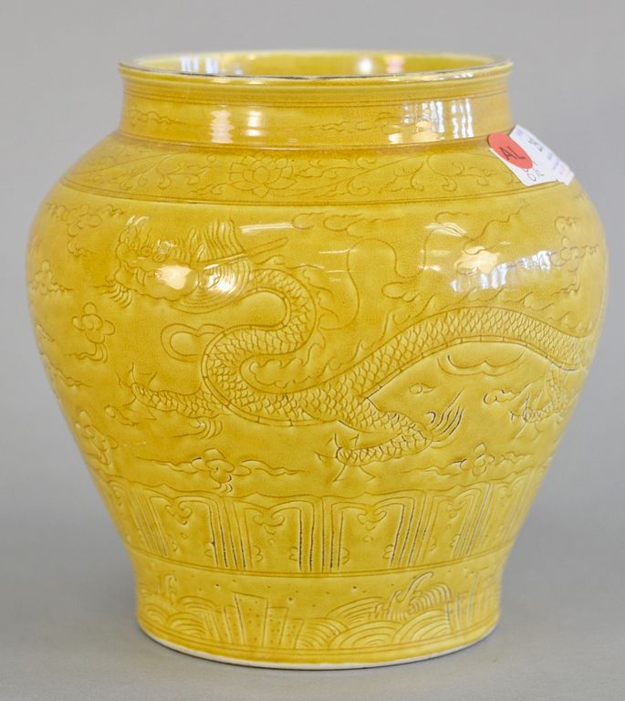 Appraisal: Yellow glazed five claw dragon vase having incised flying dragon