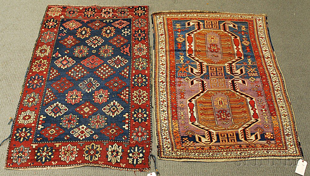 Appraisal: Two Oriental Rugs th century a Northwest Persian missing most