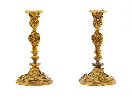 Appraisal: A Pair of Louis XV Style Gilt Bronze Candlesticks Height