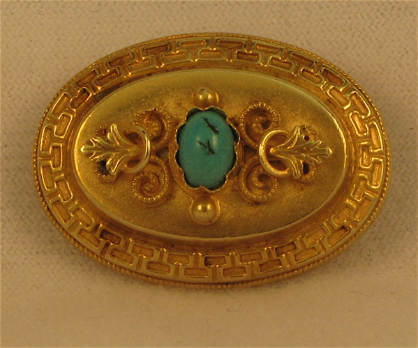 Appraisal: GREEN TURQUOISE AND FOURTEEN KARAT GOLD BROOCH set with an