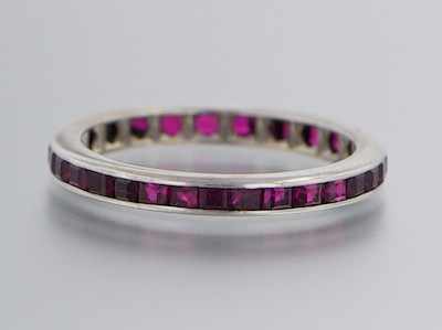 Appraisal: A White Gold and Ruby Eternity Band k white gold