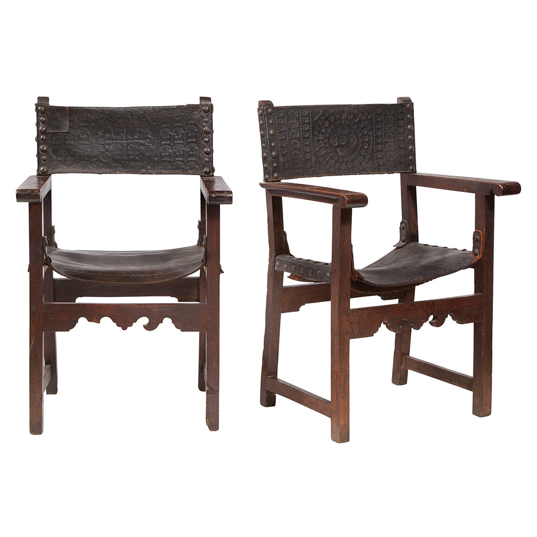 Appraisal: Pair of Continental Stained Wood Leather Upholstered Armchairs Partially th